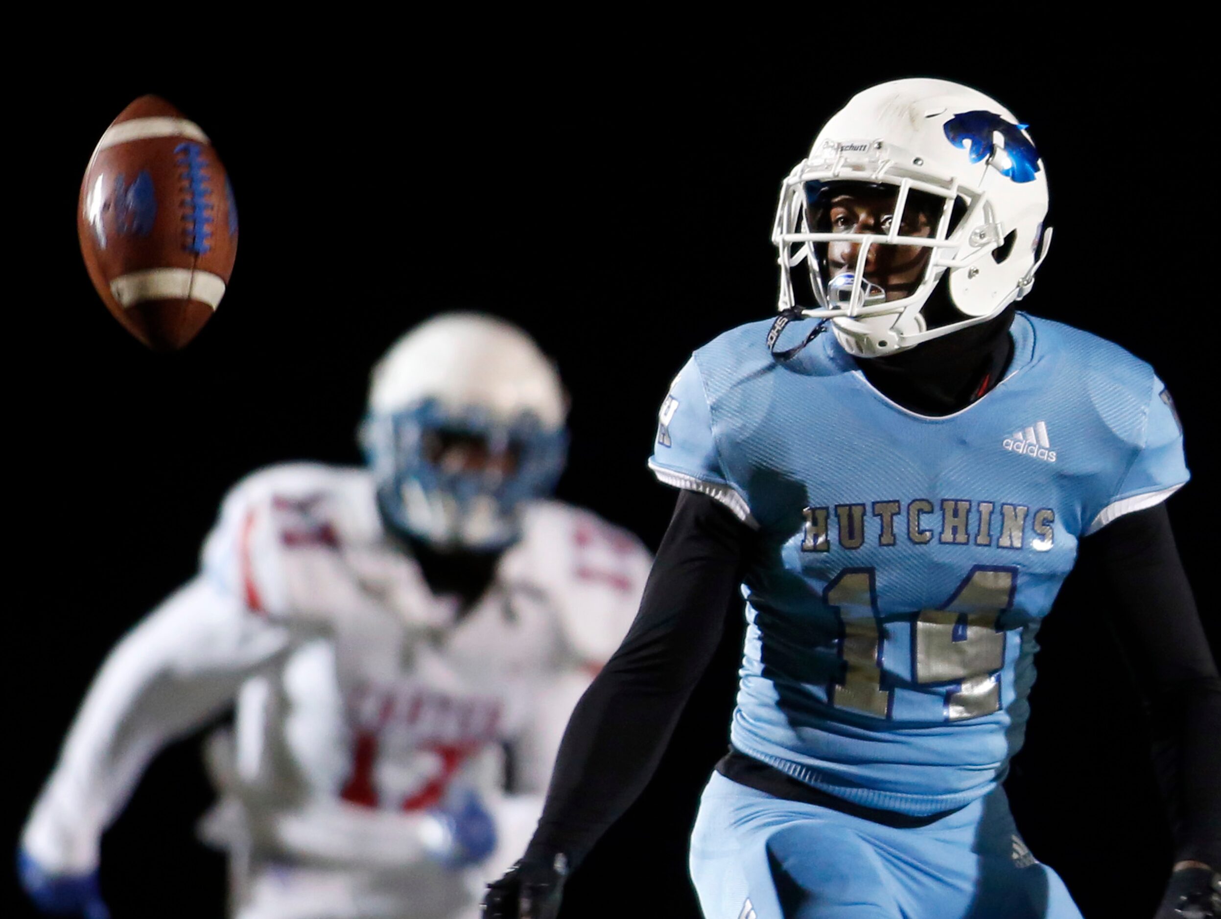 Wilmer Hutchins punter Aerion Morgan (14) looks over his shoulder for an errant snap during...