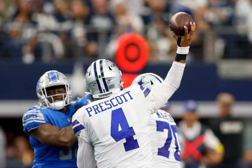 Dallas Cowboys quarterback Dak Prescott (4) throws a pass during the fourth quarter of a NFL...