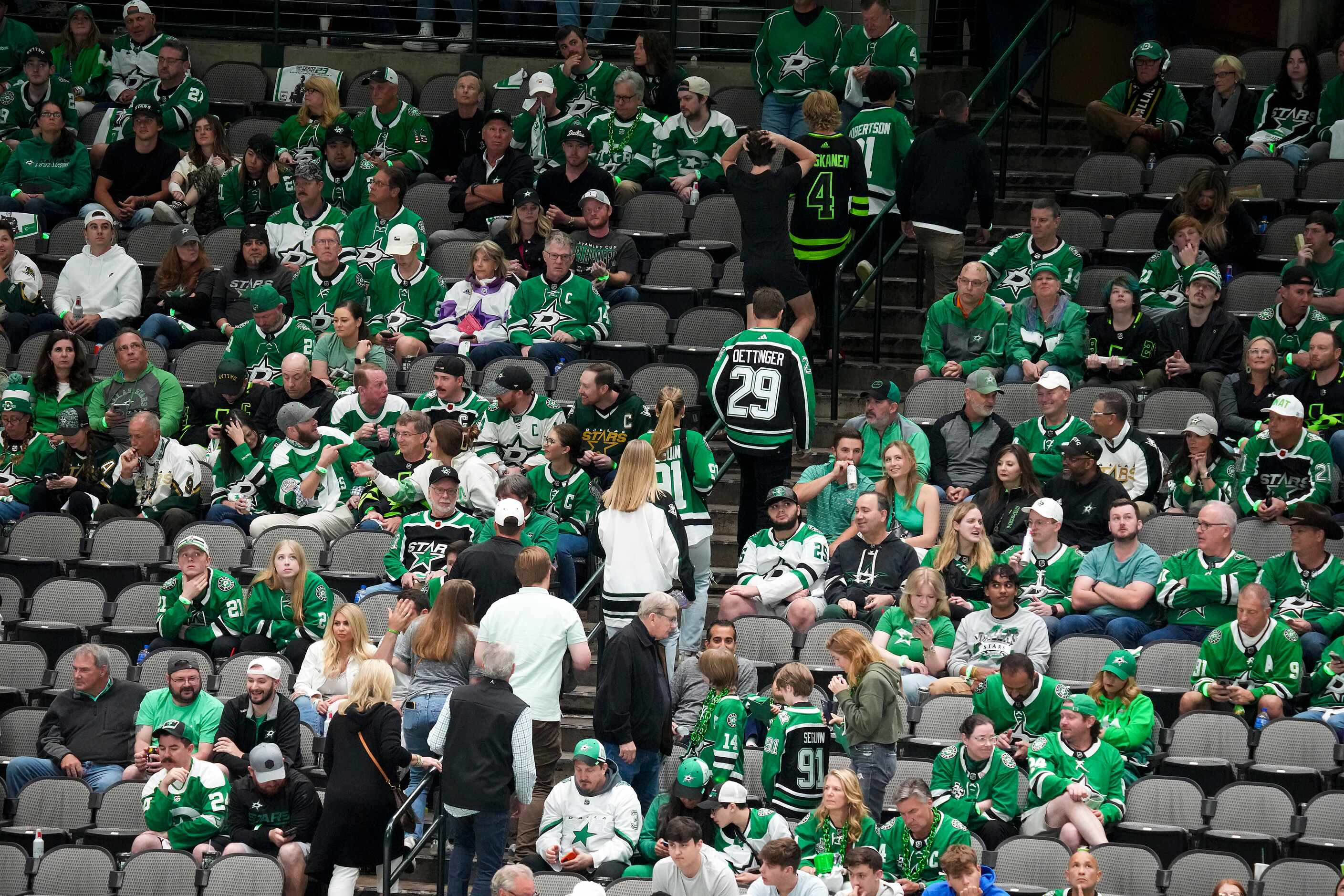 Dallas Stars fans head for the exits during the third period of a loss to the Vegas Golden...