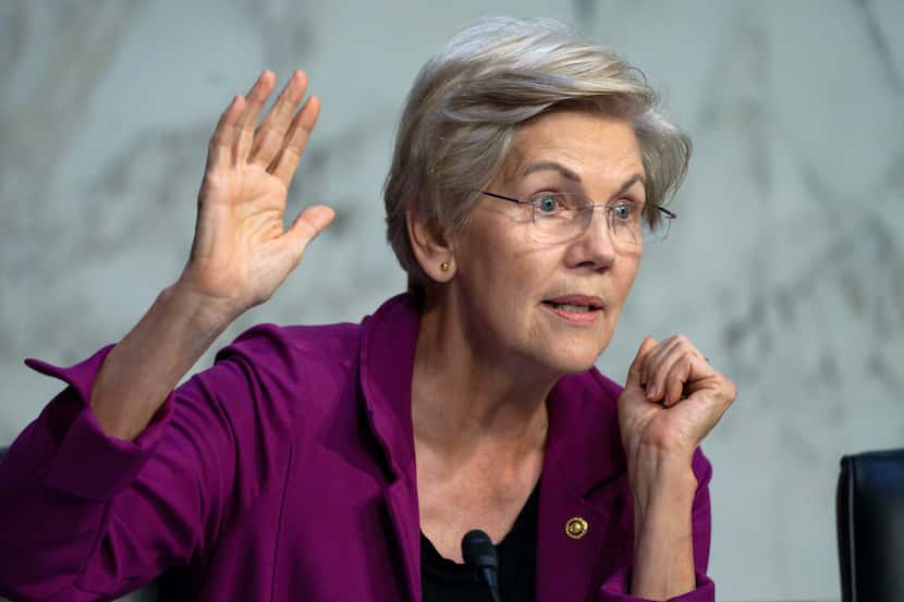 Sen. Elizabeth Warren, D-Mass., asks the nation's top bankers to raise their hand if they...