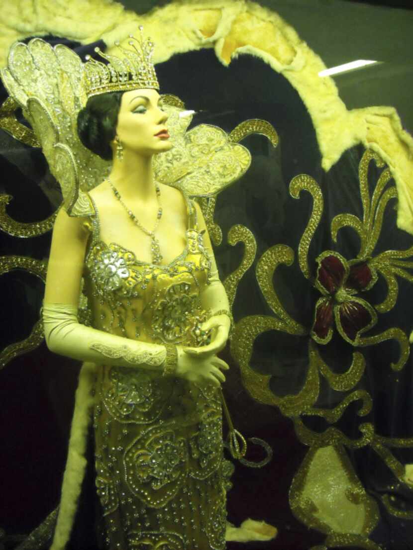 Germaine Cazenave Wells, shown in mannequin form in a Mardi Gras costumes, haunts Arnaud's...