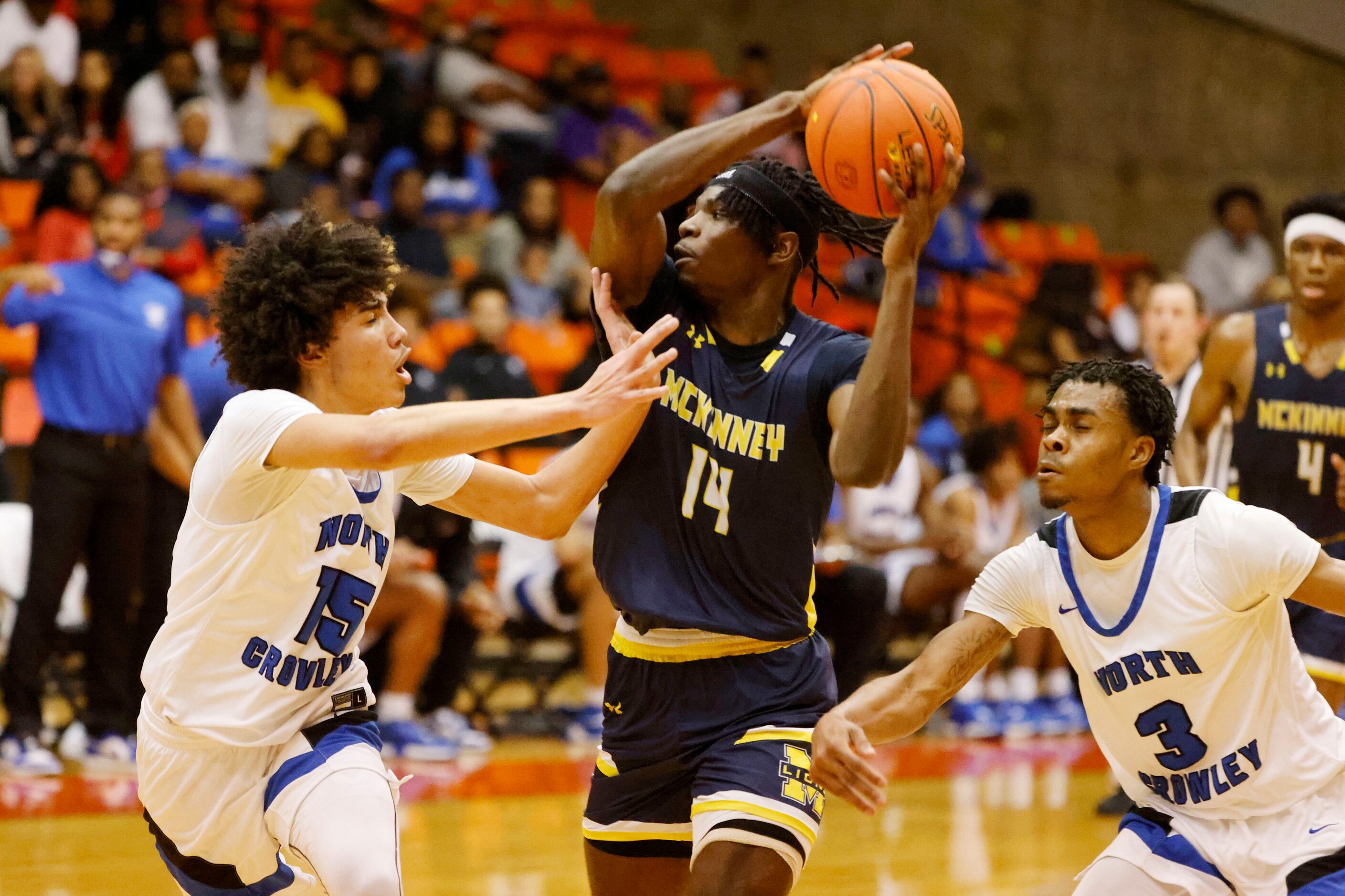 North Crowley’s Kamoni Sieber (15) fouls McKinney’s Ale Anamekwe (14) as Trey Davis (3)...