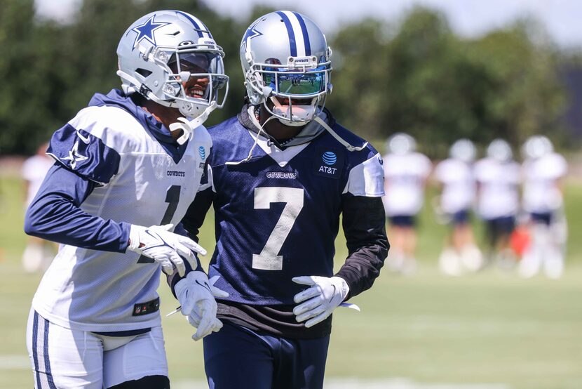 Cedrick Wilson (1) and Trevon Diggs (7) during practice at The Star in Frisco on Wednesday,...