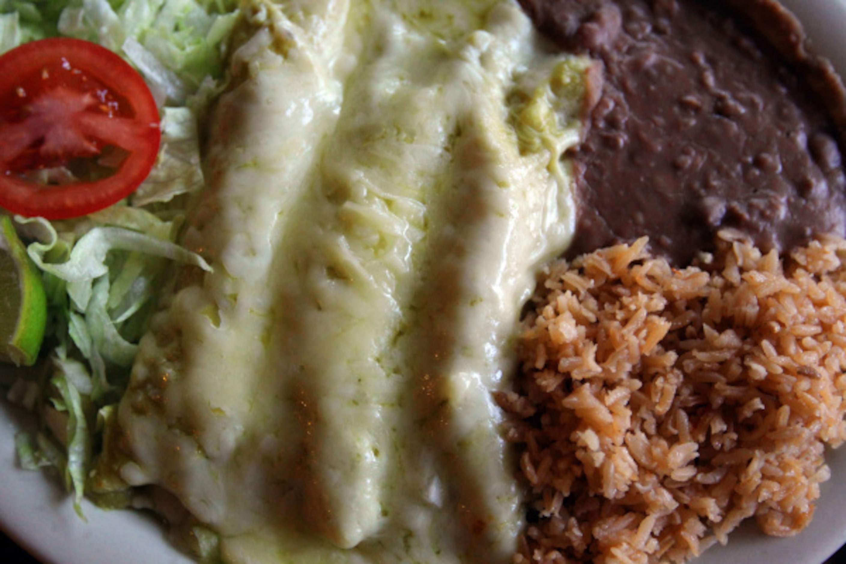 The chicken enchiladas Mexicanas at Cuquita's Restaurant; made with fresh tortillas and...