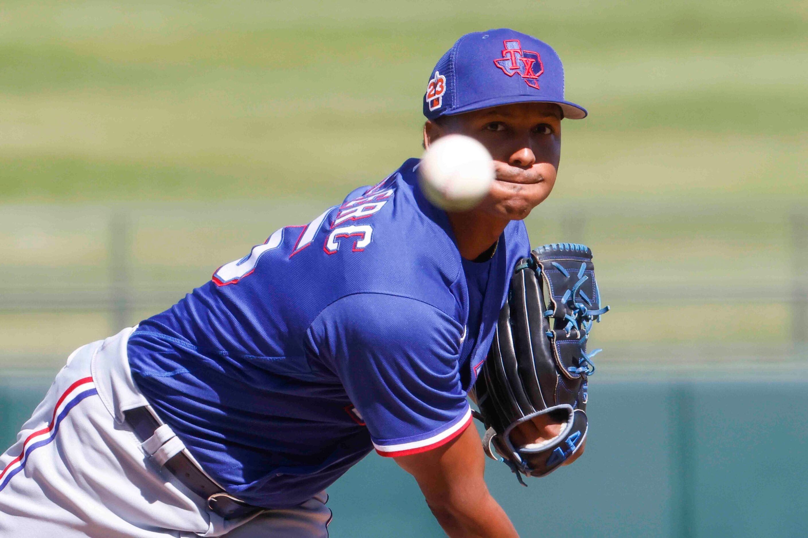 Texas Rangers Jose Leclerc throws during the third inning of a spring training game against...