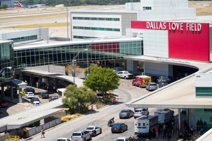 Dallas police worked a shooting scene at Dallas Love Field on July 25, 2022.