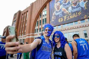 Fans gather outside of American Airlines Center prior to Game 3 of the NBA basketball finals...