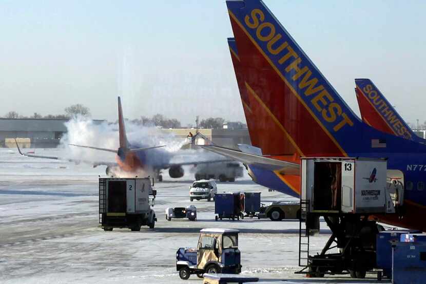 A Southwest plane is deiced at Chicago Midway International Airport earlier this month.
