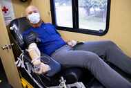 Jeff Langlitz donated blood on Aug. 26, 2021, at the McMillan James Equipment Company office...