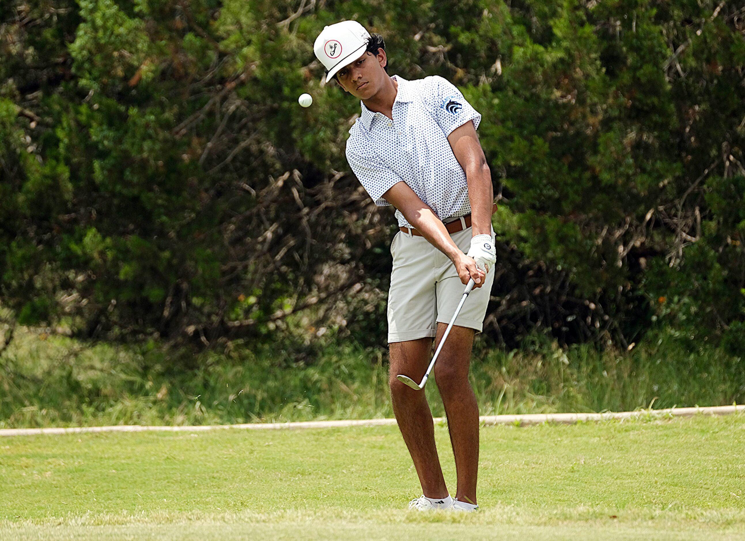 Aryan Aerrabolu of Palno West hits on the fairway during Day 2 of the UIL 6A boys golf state...