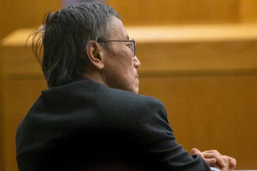 George Guo listens to closing arguments during his capital murder trial on Monday.
