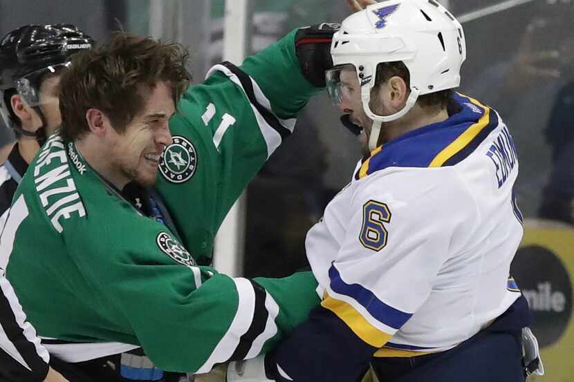 DALLAS, TX - DECEMBER 20:  Curtis McKenzie #11 of the Dallas Stars fights with Joel...