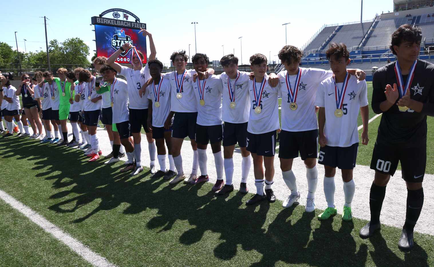 Frisco Lone Star players pose with their state championship medals following their 4-1...