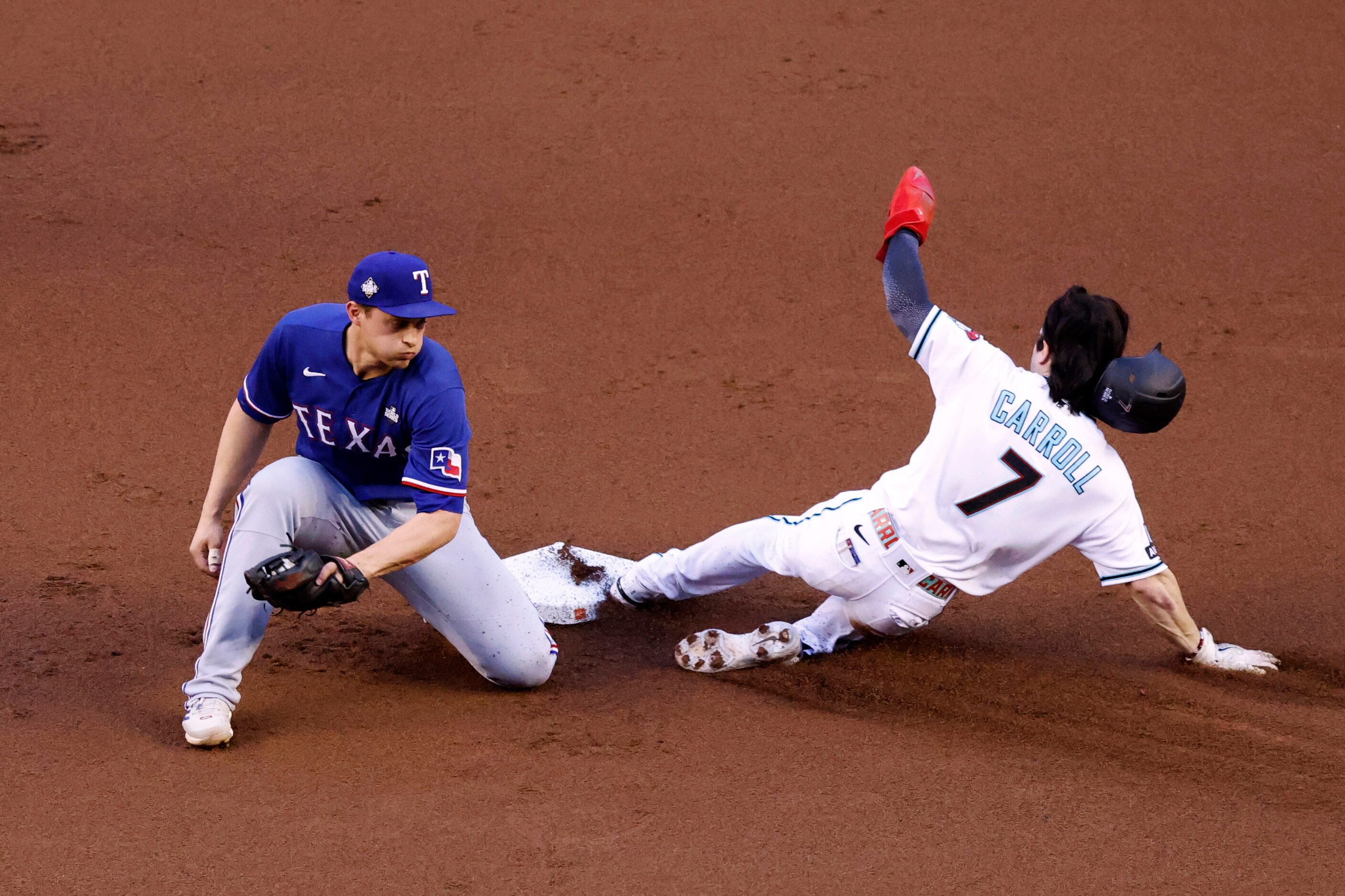 Arizona Diamondbacks right fielder Corbin Carroll (7) steals second as Texas Rangers...