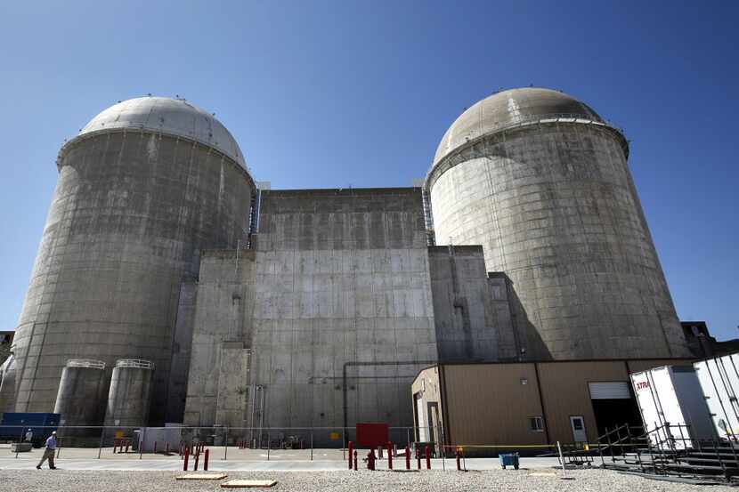 Comanche Peak Nuclear Power Plant's domed Unit 1 reactor (left) and Unit 2 reactor (right)...