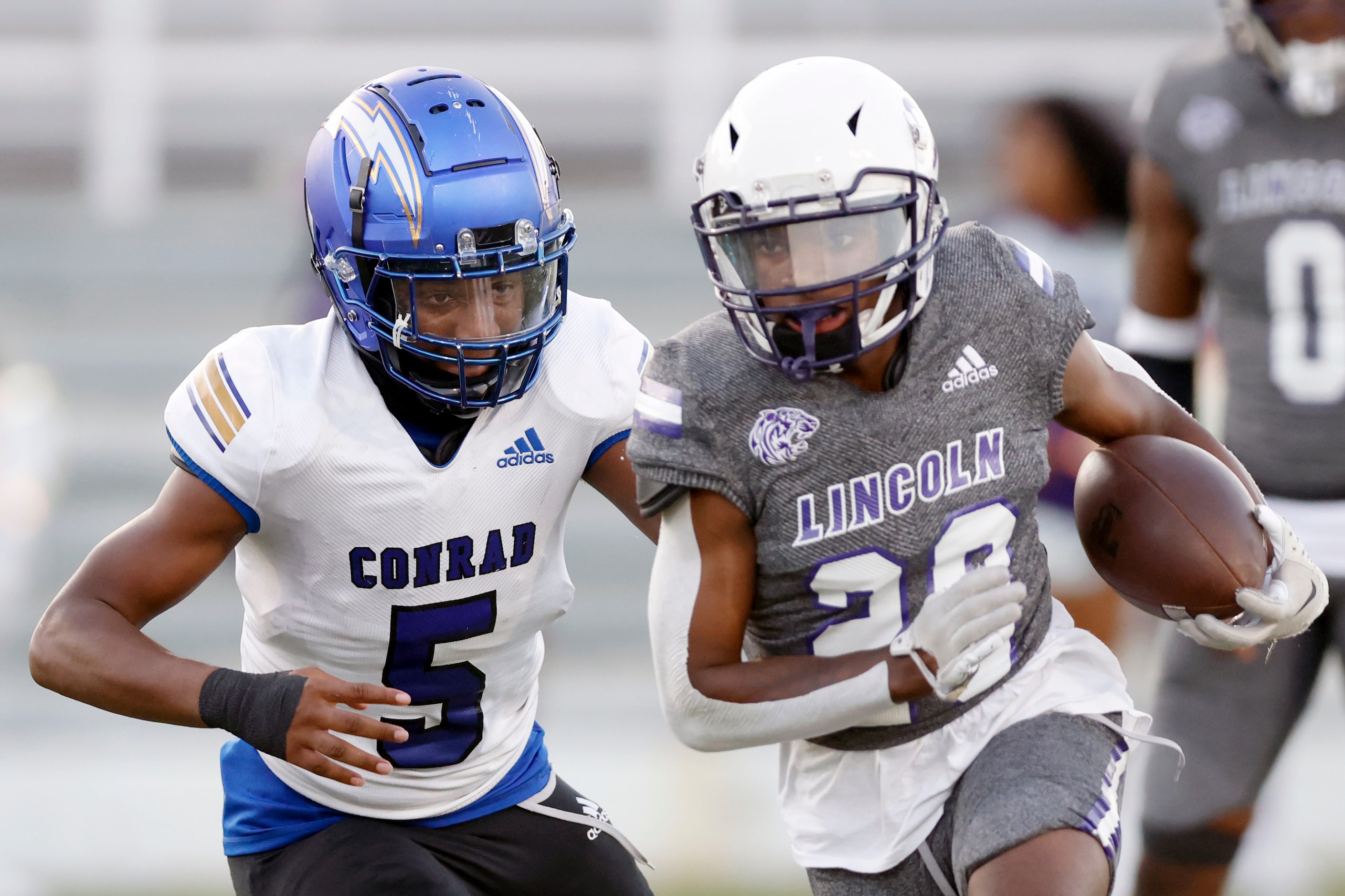 Conrad linebacker Quentin Gabriel (5) pursues Lincoln running back Jaimirian Robertson (20)...