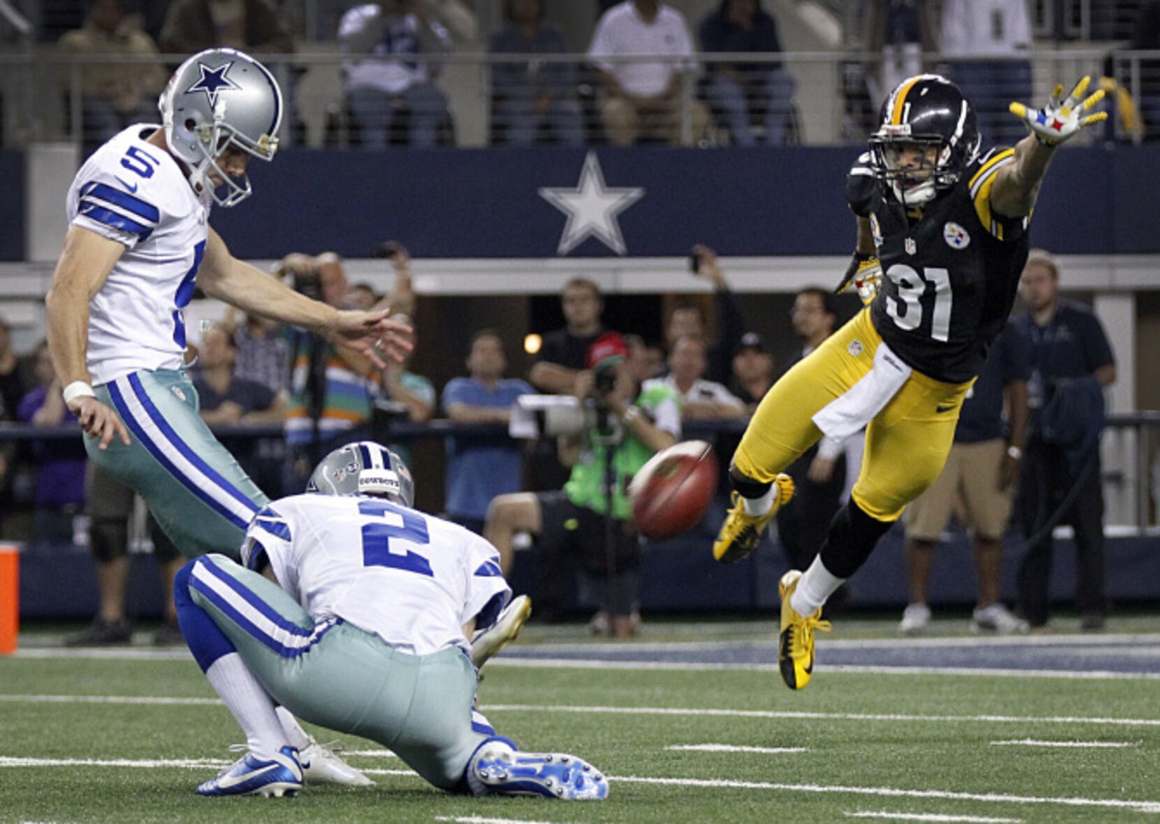 Photos: Josh Brent returns to sideline, Brandon Carr's huge