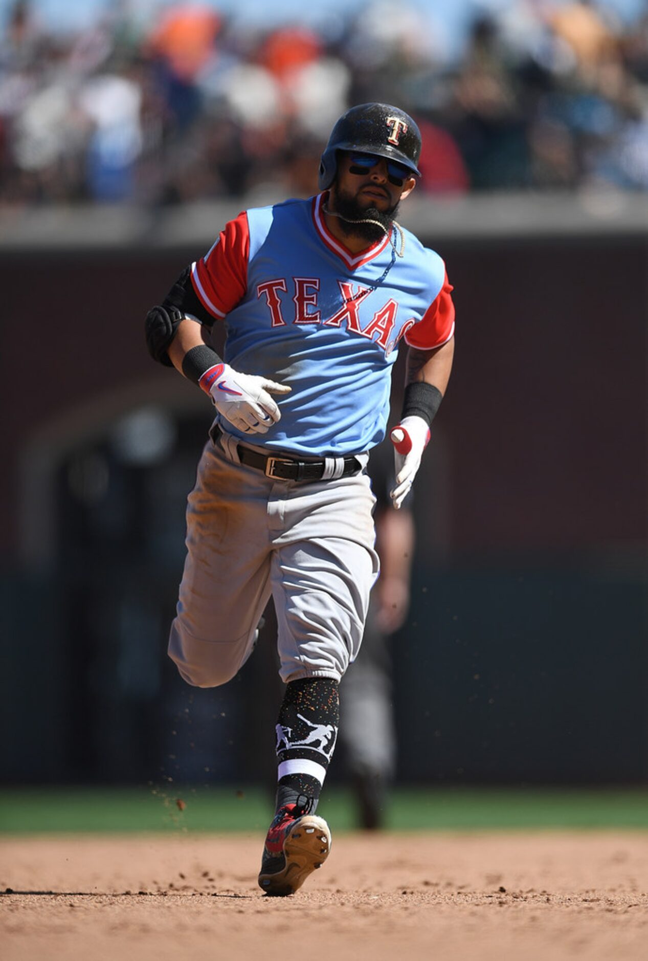 SAN FRANCISCO, CA - AUGUST 25:  Rougned Odor #12 of the Texas Rangers trots around the bases...