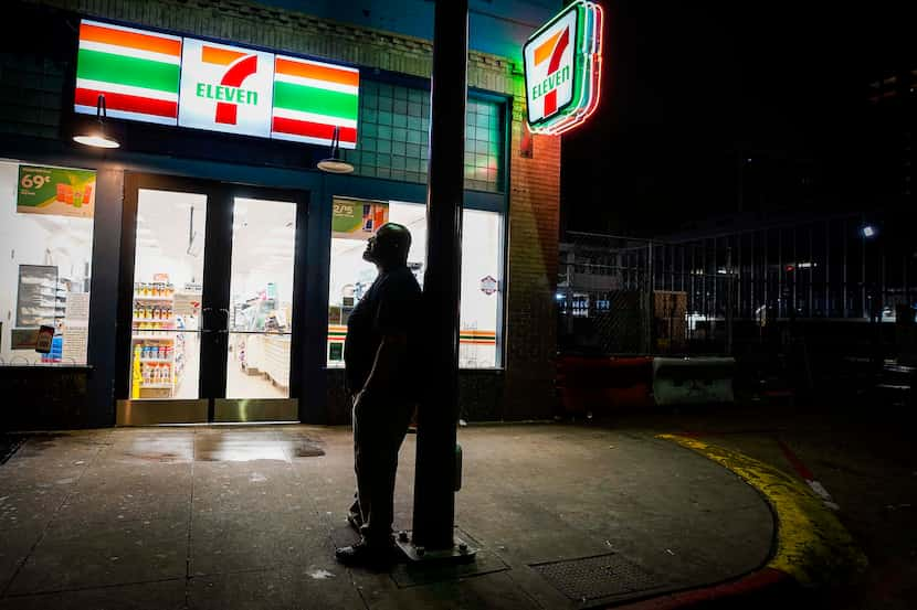 Mark Anthony Jenkins looks out over the completely empty Commerce Street in front of the...