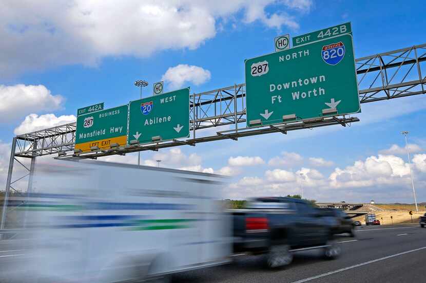 Traffic moves on the Interstate 20, U.S. Highway 287 and Interstate 820 interchange in Fort...
