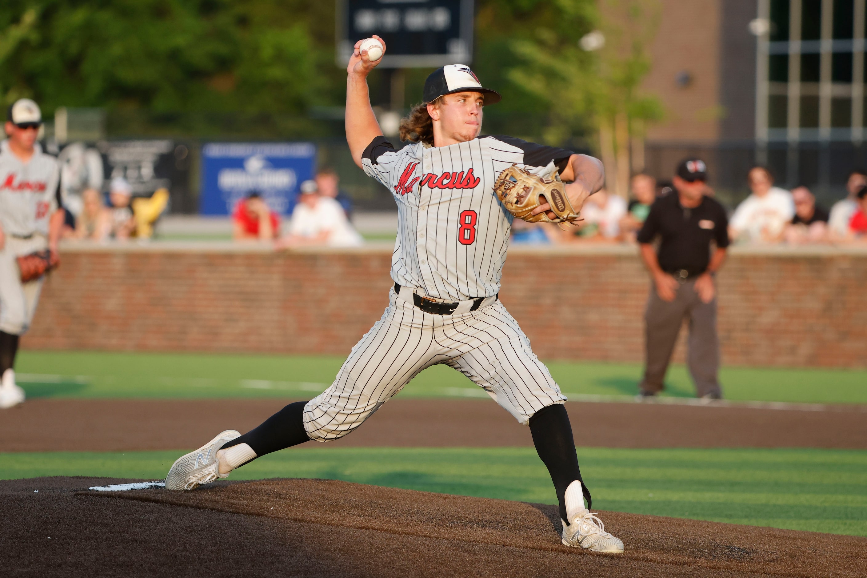 Flower Mound pitcher Nathan Harmon (8) pitches against Keller during the first inning of...