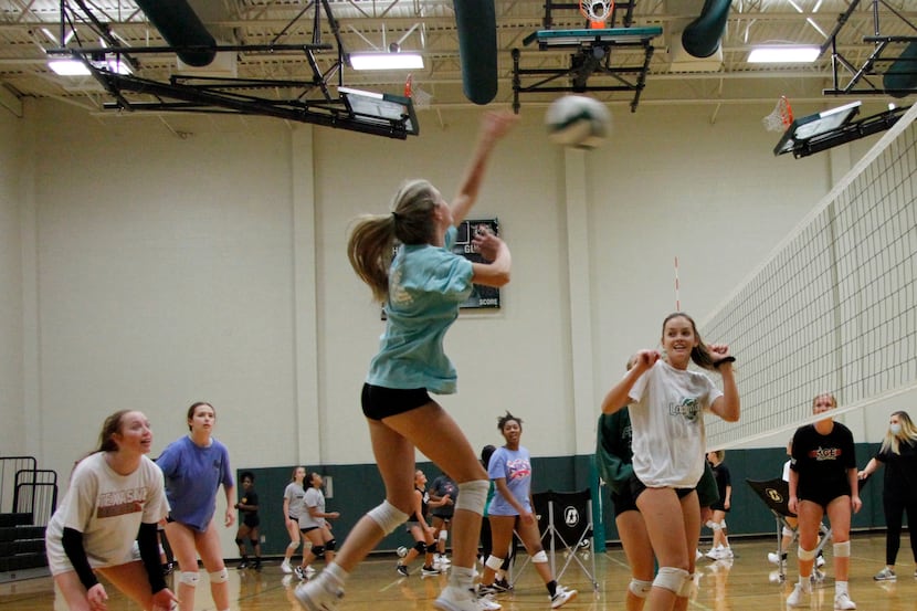 Kennedale's Grayson Reed hits a shot on the team's first day of practice on Aug. 3. (Steve...