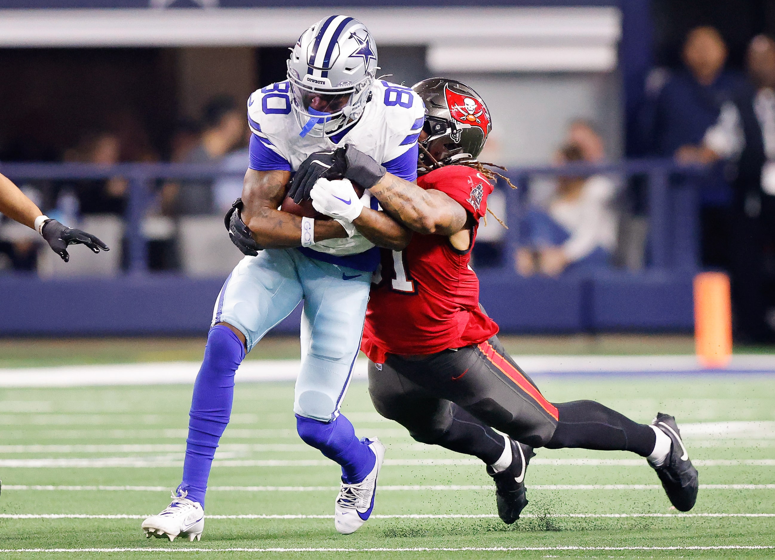 Dallas Cowboys wide receiver Ryan Flournoy (80) is tackled by Tampa Bay Buccaneers...