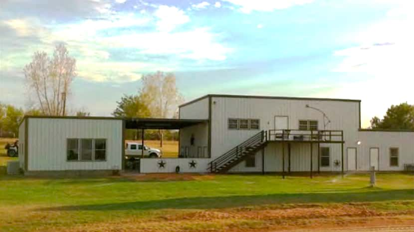 The 7,000-acre Sandhill Ranch includes a hunting lodge and other buildings.