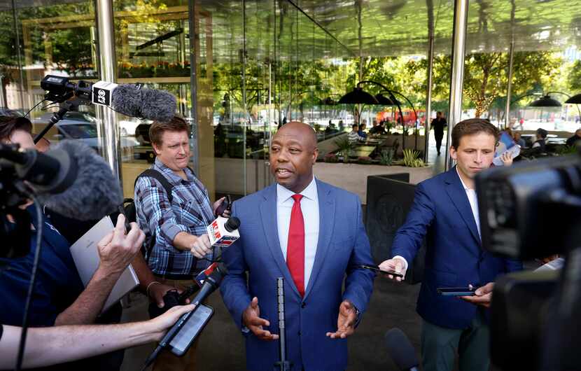 GOP presidential candidate and South Carolina Sen. Tim Scott responds to questions from the...