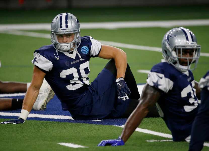 Cowboys strong safety Jeff Heath (38) stretches during practice at Ford Center at The Star...