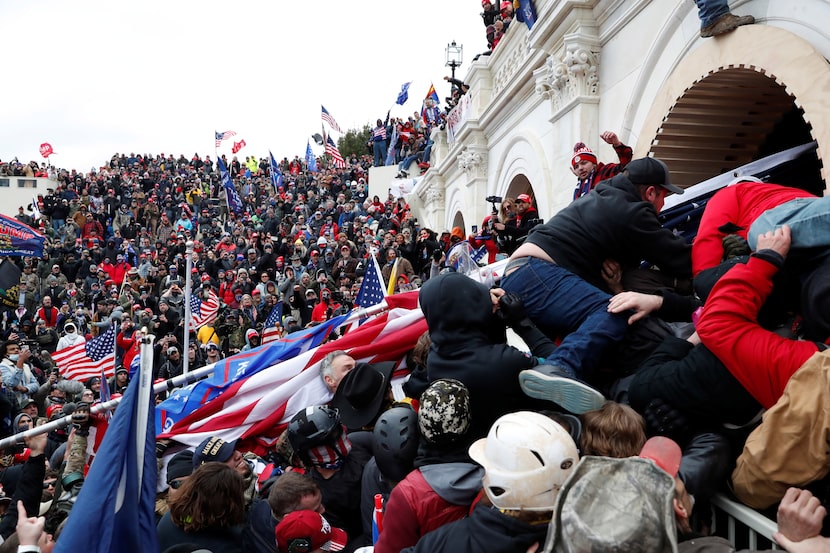 Pro-Trump protesters storm into the U.S. Capitol during clashes with police, during a rally...