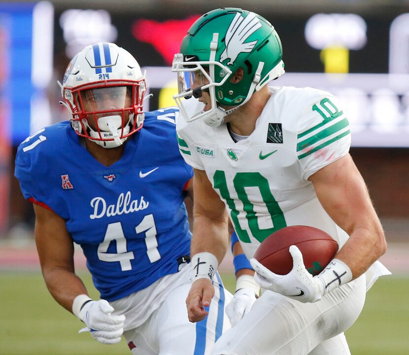 North Texas Mean Green quarterback Jace Ruder (10) carries the football as Southern...