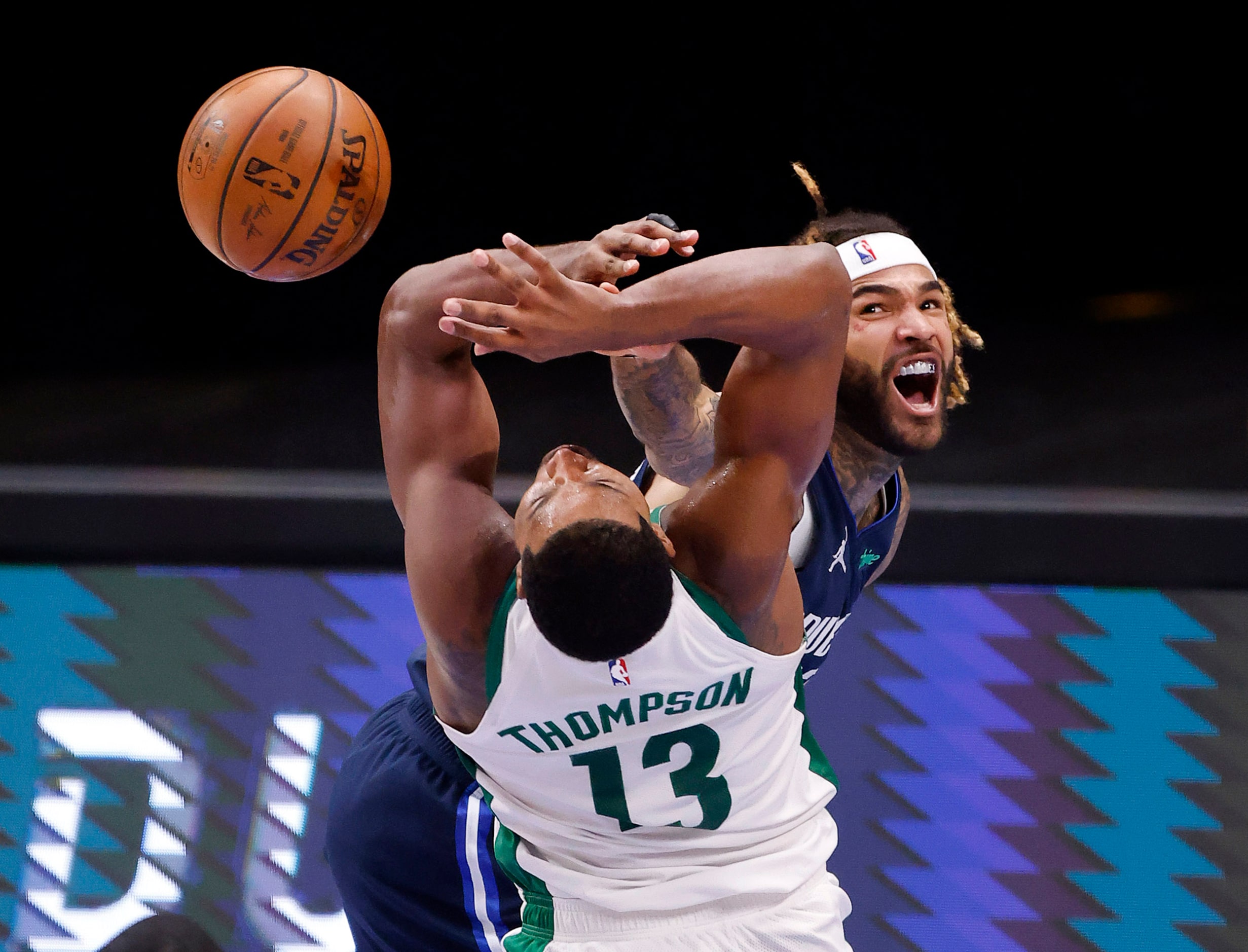 Dallas Mavericks center Willie Cauley-Stein (33) knocks the ball out of Boston Celtics...