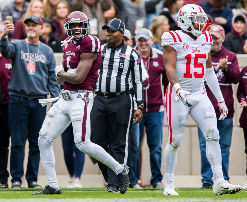 Texas A&M Aggies wide receiver Quartney Davis (1) celebrates after wide receiver Camron...