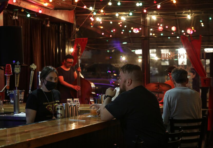 Guests and employees enjoy the evening at Deep Ellum's The Free Man in Dallas, TX, on March...