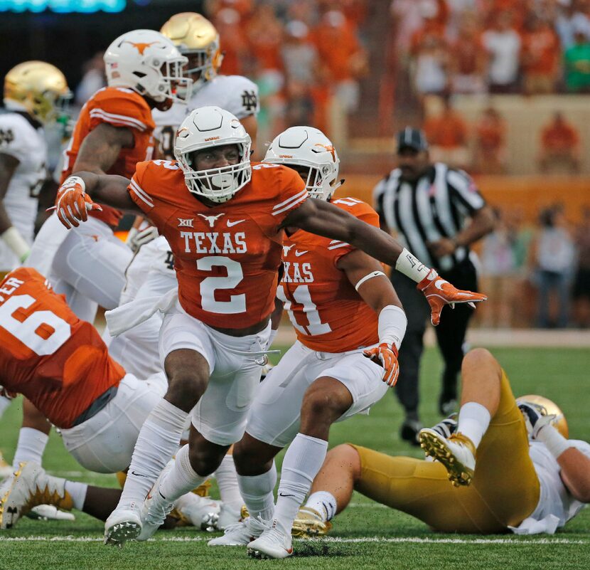 FILE - Texas cornerback Kris Boyd (2) celebrates a tackle against Notre Dame on Sunday,...