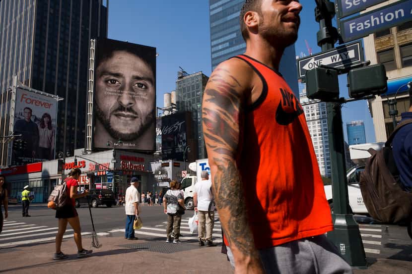 A Nike advertisement featuring Colin Kaepernick is on display Sept. 6 in New York. Nike...