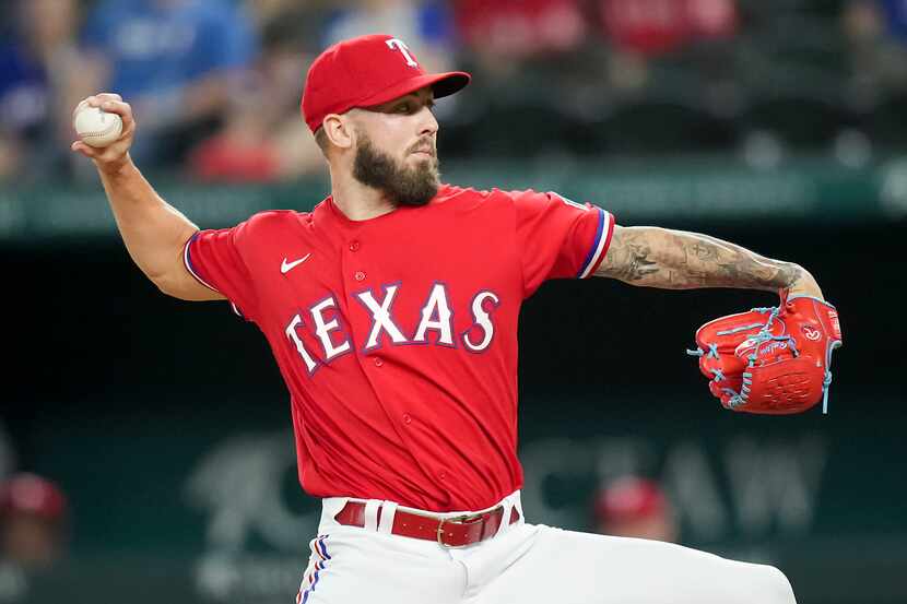 Texas Rangers relief pitcher Joe Barlow delivers during the ninth inning against the Seattle...