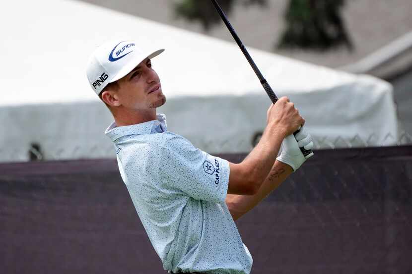 Sam Bennett drives off the seventh tee during the first round of the Rocket Mortgage Classic...
