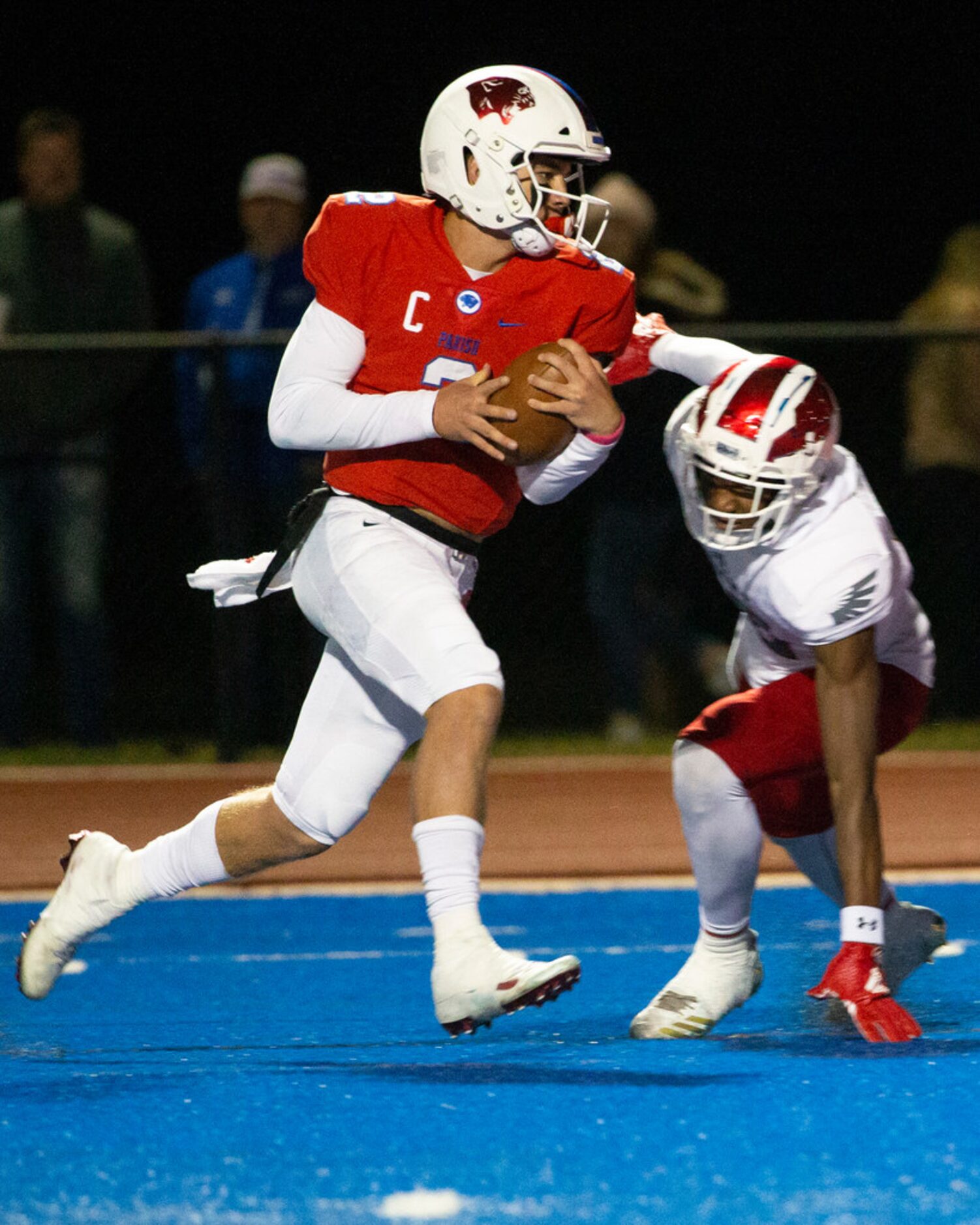 Parish Episcopal quarterback Preston Stone (2) makes a touchdown run during the football...