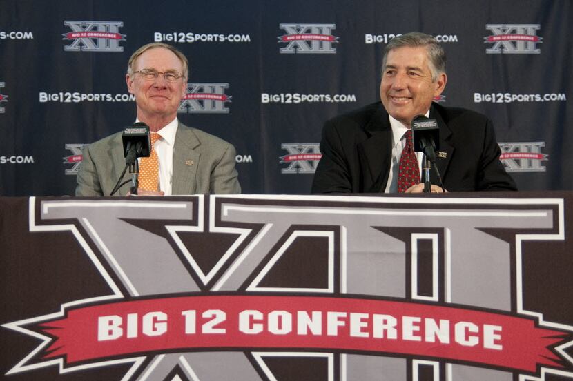 Big 12 Conference Board of Directors Chairman Burns Hargis (left) and newly selected Big 12...
