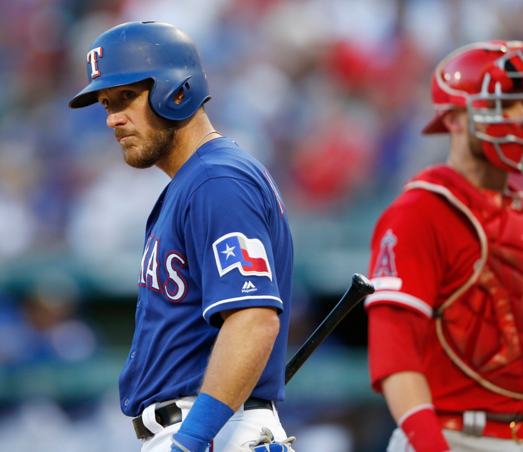 Texas Rangers catcher Jeff Mathis (2) looks towards the Los Angeles Angels dugout as...