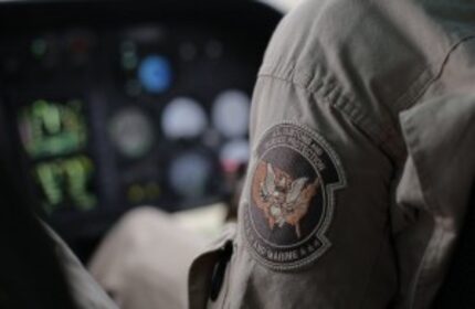  A U.S. Customs and Border Protection Air and Marine agent's patch is seen as he patrols...