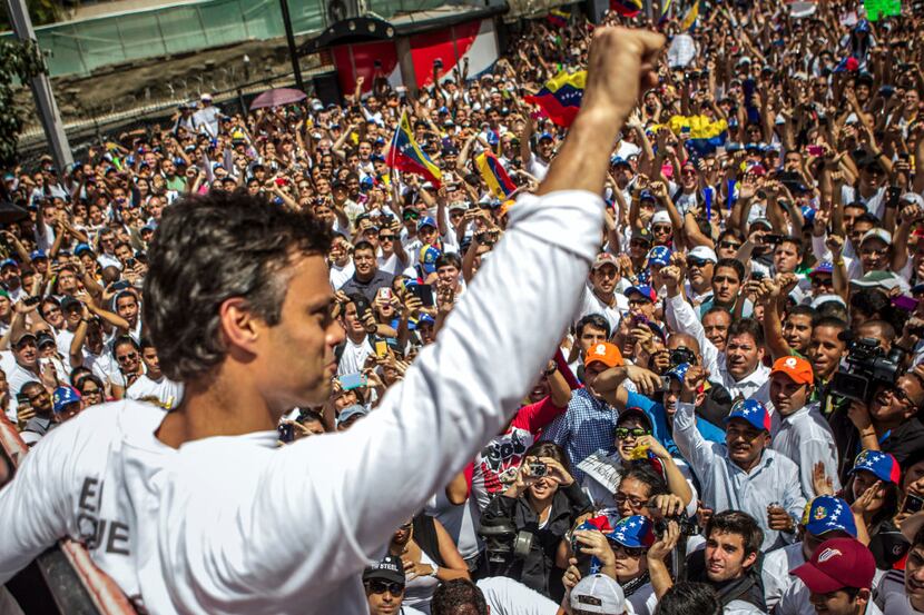 FILE-- Opposition leader Leopoldo Lopez rallies supporters before surrendering to police in...