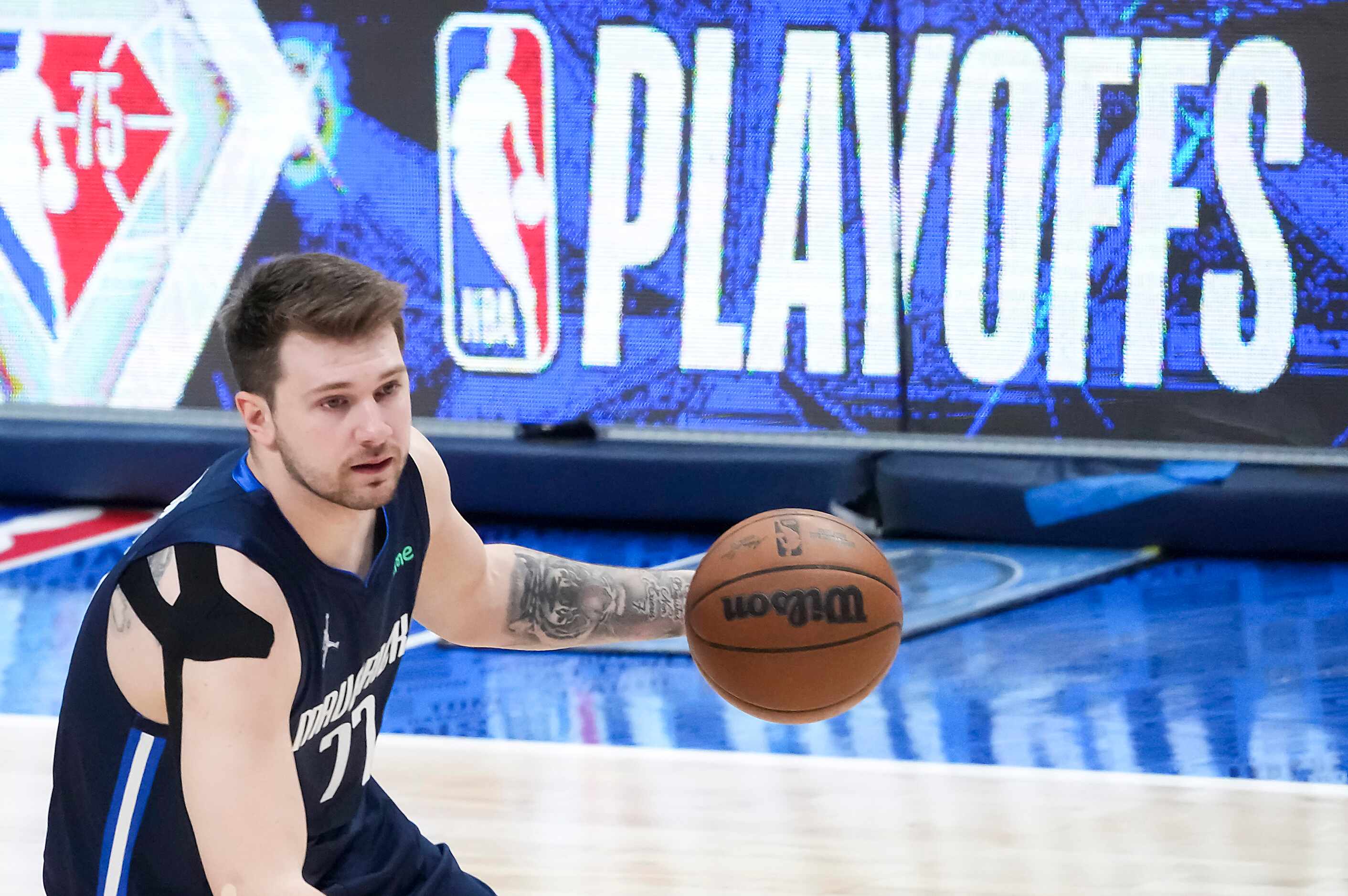 Dallas Mavericks guard Luka Doncic brings the ball up the floor during the first quarter in...