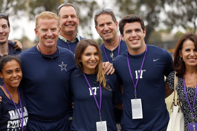 Dallas Cowboys head coach Jason Garrett is joined by members of the Scolinos family from...