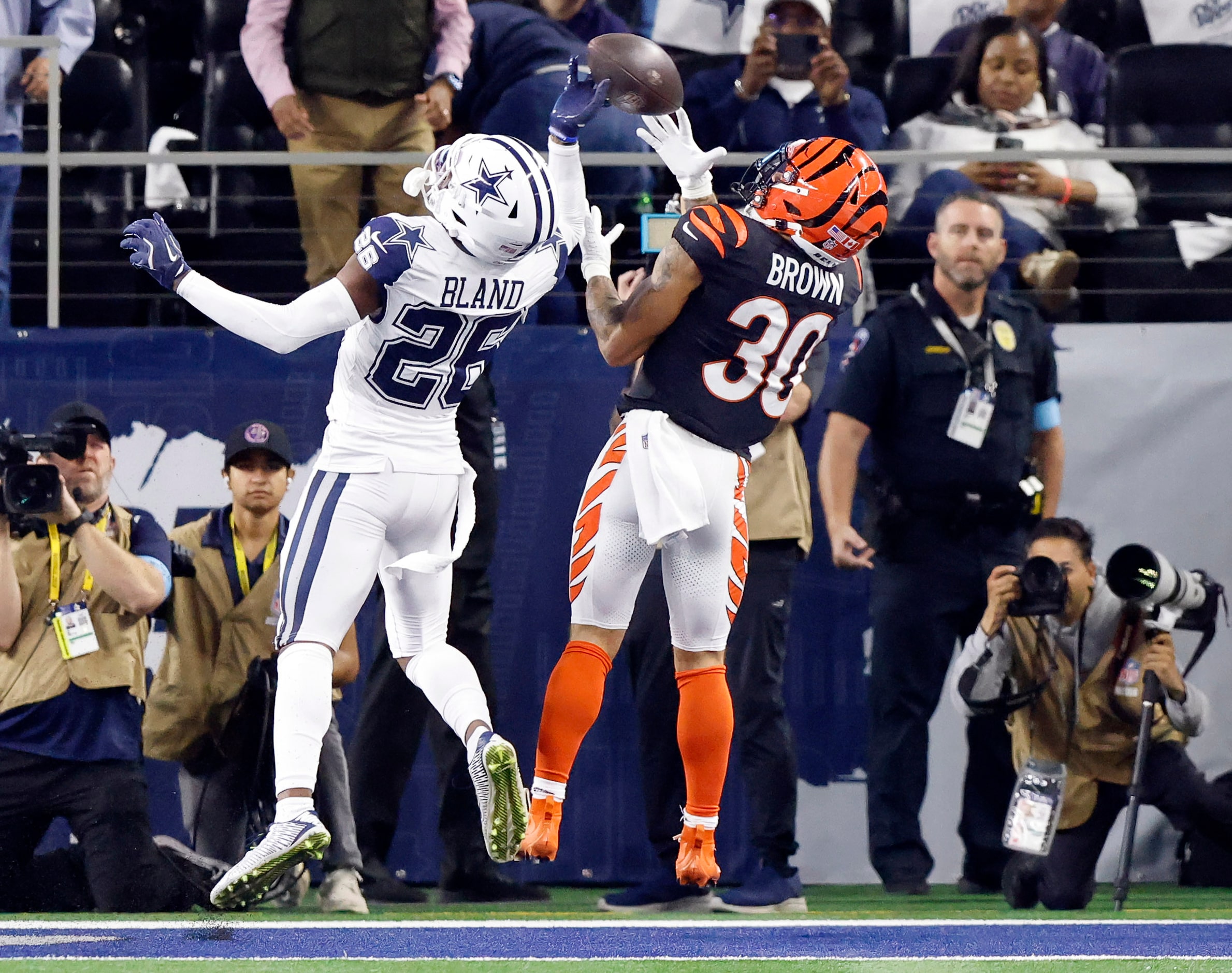 Dallas Cowboys cornerback DaRon Bland (26) breaks up a pass in the end zone intended for...