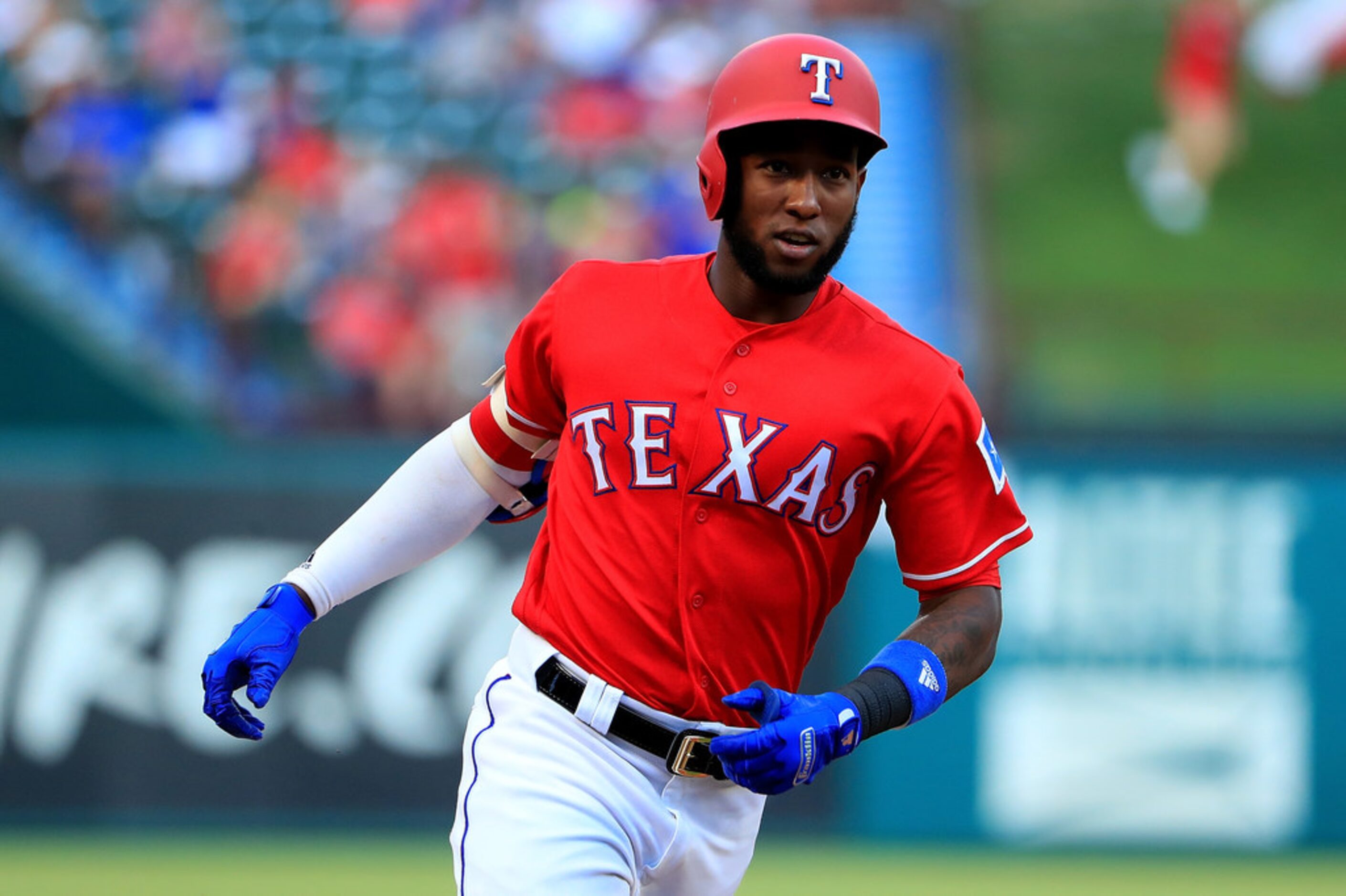 ARLINGTON, TX - JUNE 15:  Jurickson Profar #19 of the Texas Rangers rounds the bases after...