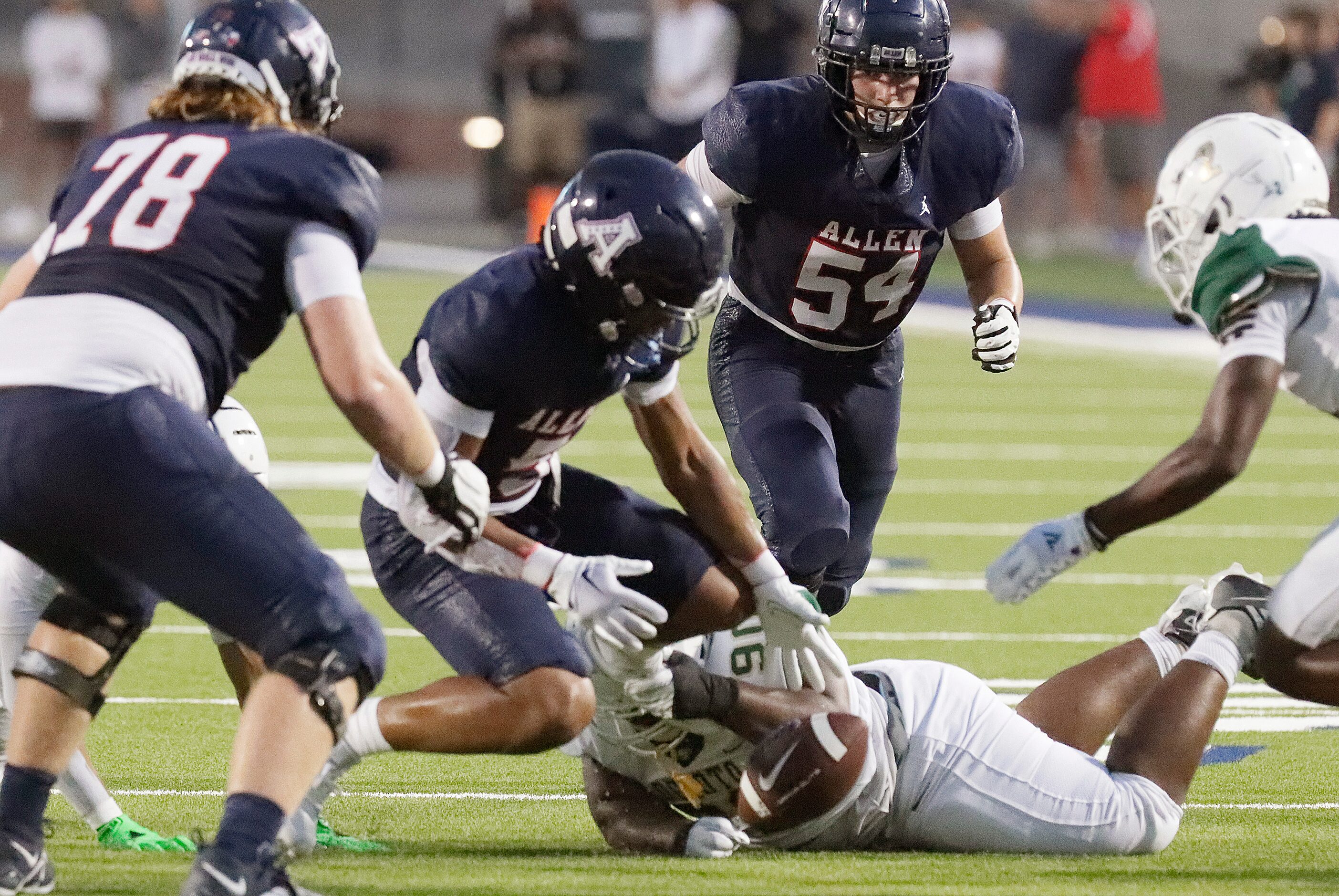 Allen High School wide receiver Quinton House-Hammonds (5) fumbles the football during the...