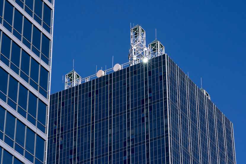 The top of Renaissance Tower gleams in the sun. It's one of downtown Dallas' biggest buildings.